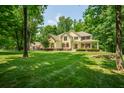Two story house with a large front yard and mature trees at 1104 W Greencastle Road, Mooresville, IN 46158