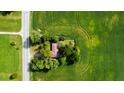 Top-down view of house in a rural area near a road, surrounded by farmland at 3910 N State Road 135, Franklin, IN 46131