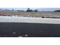 Vacant lot with snow and fencing, ready for new construction at 9280 Highpointe Ln, Zionsville, IN 46077