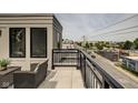 Rooftop deck with city views and modern railings at 721 E 16Th St, Indianapolis, IN 46202