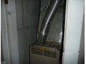 Basement furnace in a small closet at 1310 E 5Th St, Muncie, IN 47302