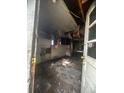 Damaged interior of a house showing significant fire damage at 904 N Penn St, Muncie, IN 47303