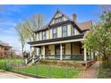 Charming Victorian home with a large front porch at 1507 Broadway St, Indianapolis, IN 46202