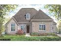 House exterior rendering with landscaping at 4212 Stone Lake Dr, Zionsville, IN 46077
