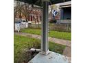 Front porch detail showcasing a weathered column and downspout at 726 Dorman St, Indianapolis, IN 46202