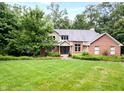Two-story home with a large lawn at 8801 Traders Lndg, Brownsburg, IN 46112