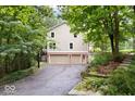 Three-car garage and large backyard at 8801 Traders Lndg, Brownsburg, IN 46112