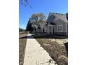 New construction homes with light blue siding and gray roofs at 855 E Harrison St, Martinsville, IN 46151
