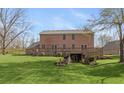 Brick house exterior with large deck and landscaped yard at 4739 Beechwood Rd, Avon, IN 46123