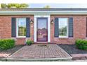 Brick house with a welcoming front door and landscaping at 345 E Main St, Jamestown, IN 46147