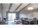 Open concept living and dining area with vaulted ceilings at 4237 Foxglove Trce, Indianapolis, IN 46237