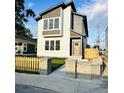 Two-story modern home with wood and light siding at 421 S Randolph St, Indianapolis, IN 46201