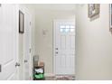 Bright entryway with coat closet and shoe storage at 3131 E Maygrove Dr, Danville, IN 46122