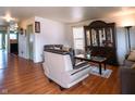 Living room featuring hardwood floors and comfy furniture at 8628 Hosta Way, Camby, IN 46113