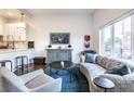 Spacious living room featuring a curved sofa and large windows at 1336 Central Ave, Indianapolis, IN 46202