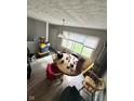 Casual dining area with hardwood floors and backyard view at 531 N Alton Ave, Indianapolis, IN 46222