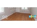 Living room with hardwood floors and lots of natural light at 3521 N Riley Ave, Indianapolis, IN 46218