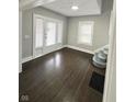 Bright living room with hardwood floors and large windows at 20 N Pershing Ave, Indianapolis, IN 46222