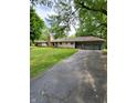 Ranch house with attached two-car garage at 1231 E 88Th St, Indianapolis, IN 46240
