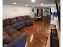 Spacious living room with hardwood floors and fireplace at 1231 E 88Th St, Indianapolis, IN 46240