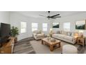 Bright living room with beige sofa and wooden coffee table at 22133 State Road 37 N, Noblesville, IN 46060