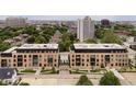 Two modern apartment buildings with landscaped grounds at 877 N East St # 104, Indianapolis, IN 46202