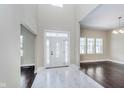 Elegant entry with white door and marble floors at 372 Foxboro Cir, Avon, IN 46123
