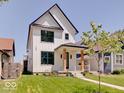 Modern farmhouse exterior with a welcoming front porch at 1544 Hoyt Ave, Indianapolis, IN 46203