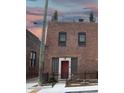 Brick building with rooftop deck and modern accents at 610 N Park Ave, Indianapolis, IN 46204