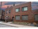 Brick building exterior, featuring multiple windows and landscaping at 610 N Park Ave, Indianapolis, IN 46204