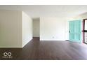 Living room with dark hardwood floors at 3720 Breen Dr, Indianapolis, IN 46235