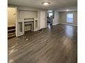 Spacious living area with hardwood floors and built-ins at 952 N Concord St, Indianapolis, IN 46222