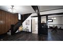 Living room and dining area with dark hardwood floors at 526 N Emerson Ave, Indianapolis, IN 46219