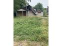 Image shows a damaged house needing major repairs at 3343 S Lyons Ave, Indianapolis, IN 46221