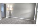 Empty spare bedroom with neutral walls and carpet at 276 Rocky Rd, Greenfield, IN 46140