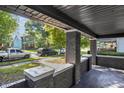 Front porch with brick columns and a view of the street at 618 N Gladstone Ave, Indianapolis, IN 46201