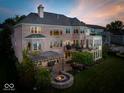 Back of house features a patio, fire pit, and pergola at 9088 Nautical Watch Dr, Indianapolis, IN 46236