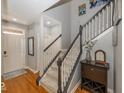 Bright entryway with hardwood floors and staircase at 13094 Overview Dr # 5D, Fishers, IN 46037