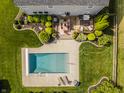 Aerial view of backyard oasis with pool and deck at 8816 Blue Marlin Dr, Indianapolis, IN 46239