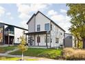 Modern two-story home with gray and white exterior at 1643 Sheldon St, Indianapolis, IN 46218