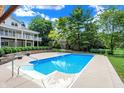 Relaxing pool area with patio and house view at 2150 Washington St, Columbus, IN 47201