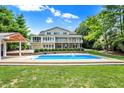 Inviting swimming pool with spacious backyard at 2150 Washington St, Columbus, IN 47201
