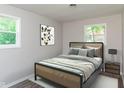 Bright bedroom with a comfortable bed and plenty of natural light at 975 Rolling Hill Rd, Greenwood, IN 46142