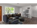 Spacious living room featuring a sectional sofa and stylish coffee table at 975 Rolling Hill Rd, Greenwood, IN 46142