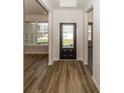 Bright entryway with dark hardwood floors at 9227 Brookview Ave, McCordsville, IN 46055