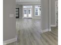 Open great room with door to backyard at 11419 Neptune Dr, Fishers, IN 46040