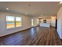 Open living room with kitchen and lake view at 1126 Fleming Dr, Greenfield, IN 46140