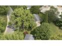 Aerial view of house nestled amongst large trees at 449 Emerson Rd, Carmel, IN 46032