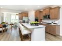 Modern kitchen with stainless steel appliances and an island at 18452 Depoe Ln, Westfield, IN 46074