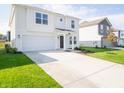 Two-story house with attached garage and driveway at 2949 W Bargello Ln, Monrovia, IN 46157